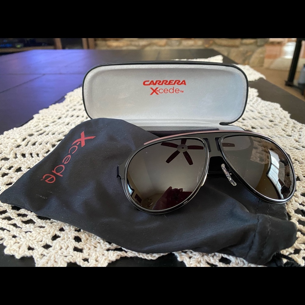 Carrera sunglasses with protective sleeve & case.